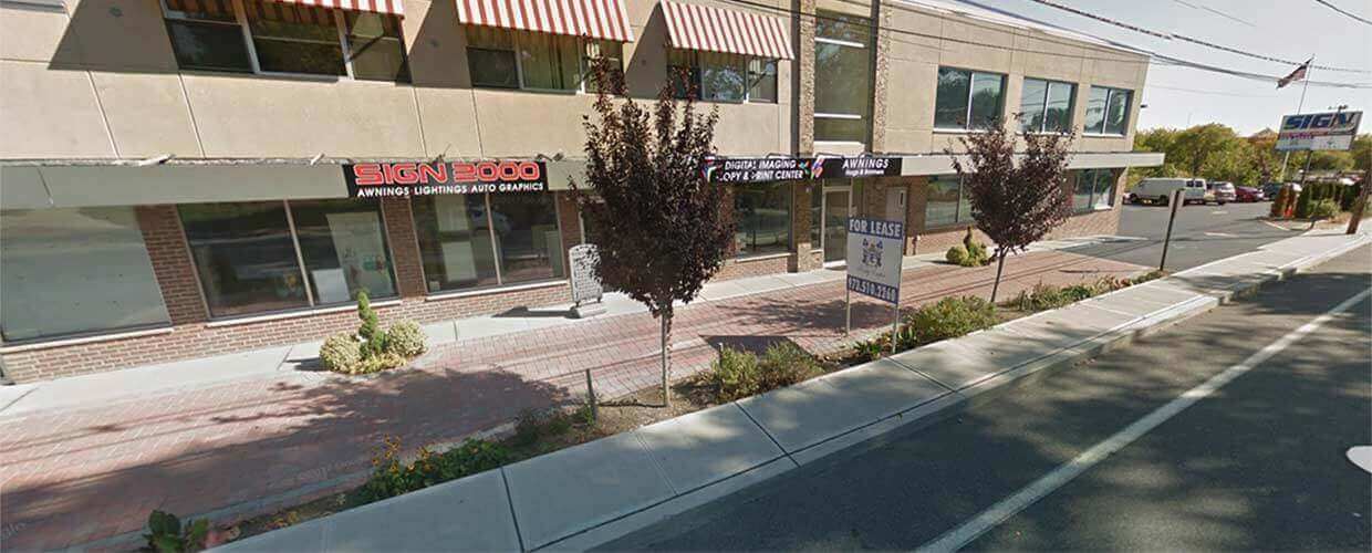 sign2000-building-view2 Building Outside 2